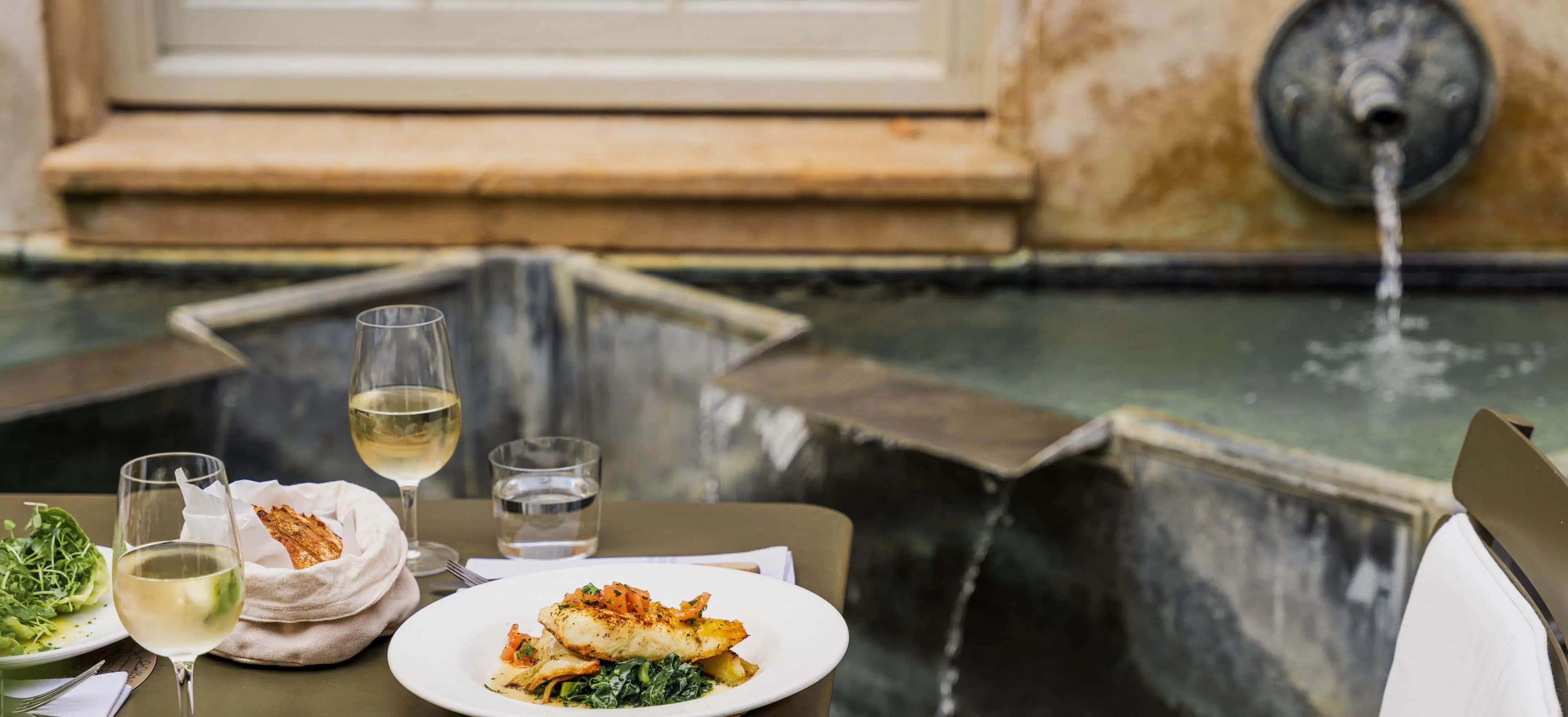 A7R00926-2023-Quod-Restaurant-Bar-Oxford-High-Res-Italian-Garden-Terrace-Fountain-Food-Halibut-Fish-White-Wine-Web-Hero-aspect-ratio-3840-1758