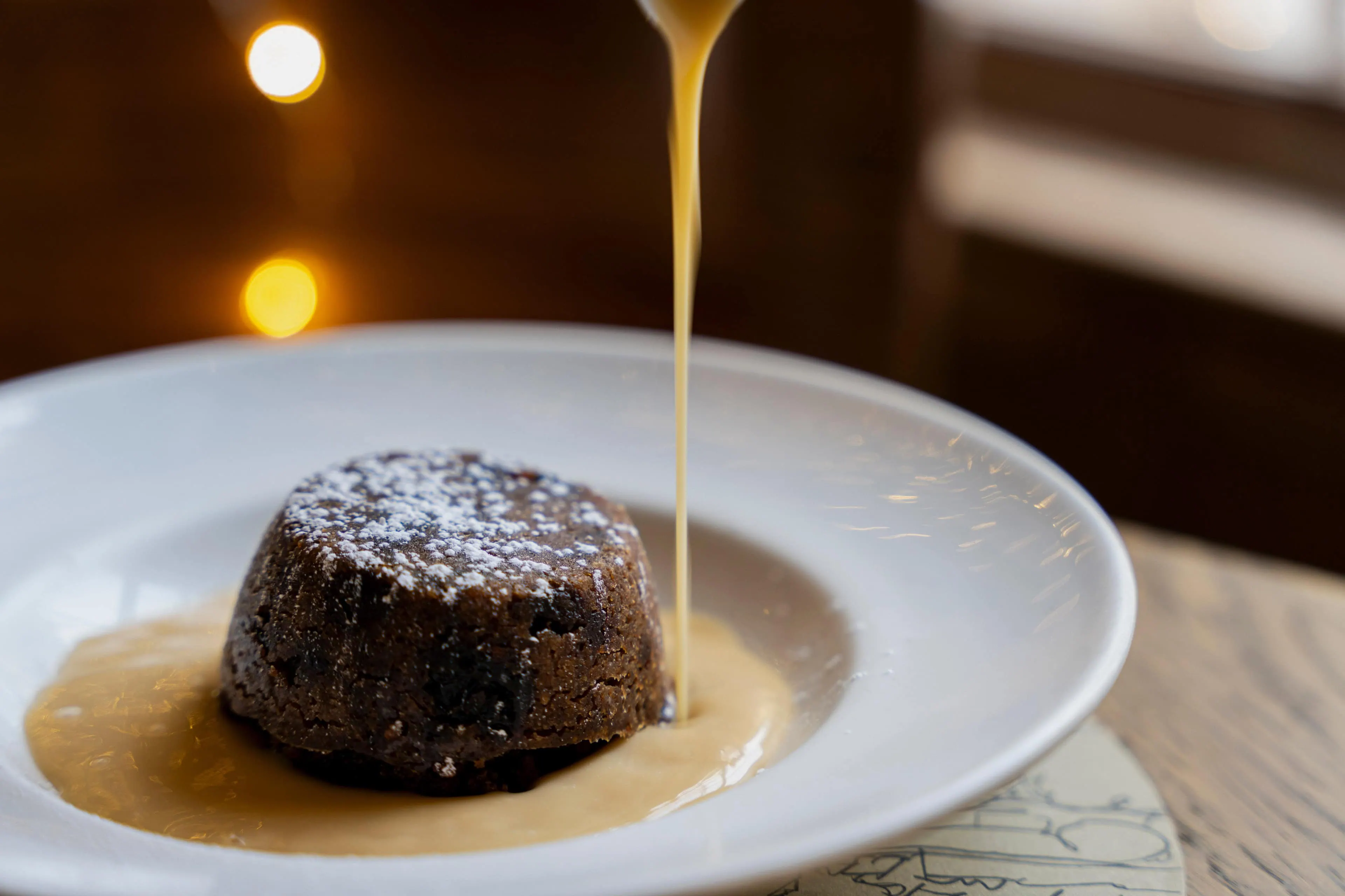 A7R06369 - 2023 - Quod Restaurant & Bar - Oxford - High Res - Festive, Dining, Christmas Pudding, Cognac Custard, Pudding - Web Hero