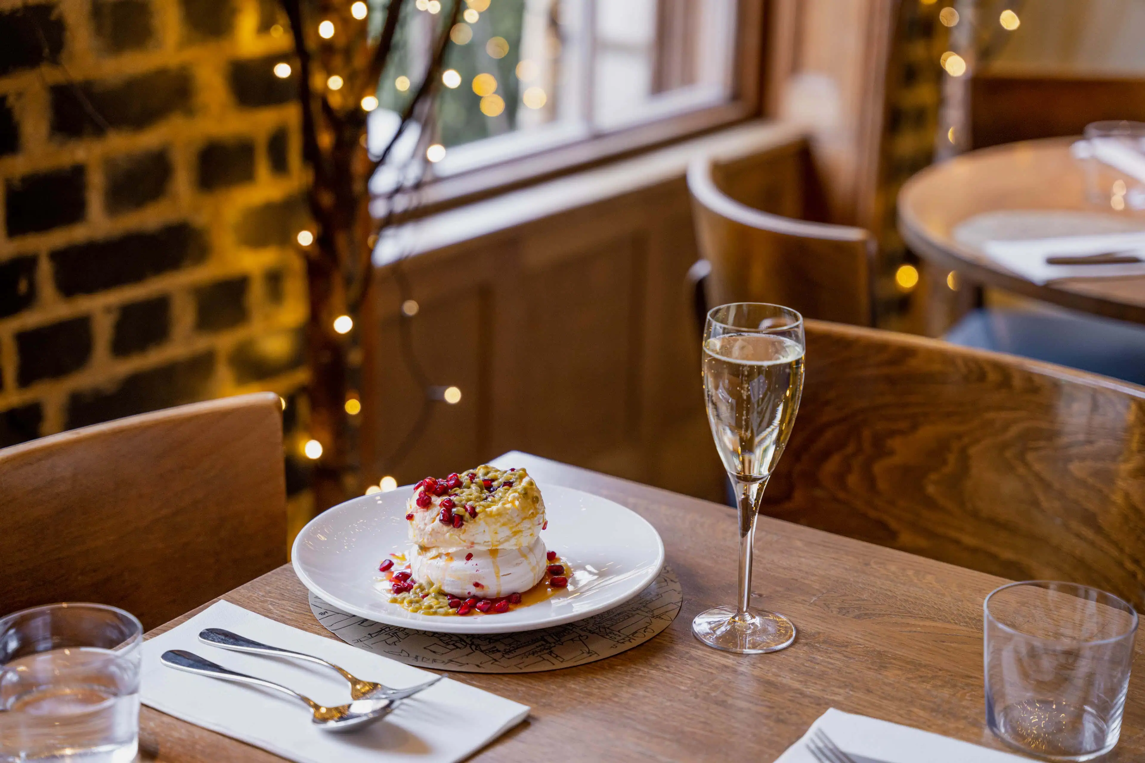 S7R02196 - 2022 - Quod Restaurant & Bar - Oxford - High Res - Festive Passion Fruit Pomegranate Pavlova_ - Web Hero